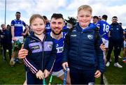 31 March 2024; Ryan Mullaney of Laois celebrates with his niece Eadaoin, age 6, and nephew Cormack, age 8, after the Allianz Hurling League Division 2A Final match between Carlow and Laois at Netwatch Cullen Park in Carlow. Photo by Ben McShane/Sportsfile