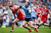 31 March 2024; Con O'Callaghan of Dublin in action against Christopher McKaigue of Derry during the Allianz Football League Division 1 Final match between Dublin and Derry at Croke Park in Dublin. Photo by Piaras Ó Mídheach/Sportsfile