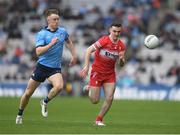 31 March 2024; Tom Lahiff of Dublin in action against Diarmuid Baker of Derry during the Allianz Football League Division 1 Final match between Dublin and Derry at Croke Park in Dublin. Photo by John Sheridan/Sportsfile