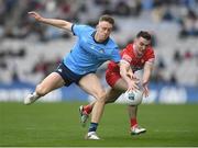 31 March 2024; Tom Lahiff of Dublin in action against Diarmuid Baker of Derry during the Allianz Football League Division 1 Final match between Dublin and Derry at Croke Park in Dublin. Photo by John Sheridan/Sportsfile