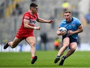 31 March 2024; Ciarán Kilkenny of Dublin in action against Conor Doherty of Derry during the Allianz Football League Division 1 Final match between Dublin and Derry at Croke Park in Dublin. Photo by Piaras Ó Mídheach/Sportsfile