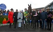 31 March 2024; Winning connections, including owner JP McManus, jockey Mark Walsh, and trainer Jimmy Mangan, after sending out Spillane's Tower to win the WillowWarm Gold Cup on day two of the Fairyhouse Easter Festival at Fairyhouse Racecourse in Ratoath, Meath. Photo by Seb Daly/Sportsfile