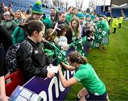 31 March 2024; Eve Higgins of Ireland signs autographs after the Women's Six Nations Rugby Championship match between Ireland and Italy at the RDS Arena in Dublin. Photo by Harry Murphy/Sportsfile
