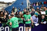 31 March 2024; Nicole Fowley and Eve Higgins of Ireland sign autographs and take pictures with supporters after the Women's Six Nations Rugby Championship match between Ireland and Italy at the RDS Arena in Dublin. Photo by Harry Murphy/Sportsfile