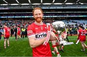31 March 2024; Derry captain Conor Glass with the trophy after the Allianz Football League Division 1 Final match between Dublin and Derry at Croke Park in Dublin. Photo by Ramsey Cardy/Sportsfile