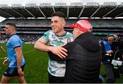 31 March 2024; Derry manager Mickey Harte and Derry goalkeeper Odhran Lynch celebrate after the Allianz Football League Division 1 Final match between Dublin and Derry at Croke Park in Dublin. Photo by Ramsey Cardy/Sportsfile