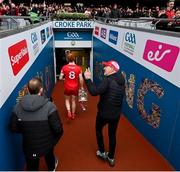 31 March 2024; Derry manager Mickey Harte and captain Conor Glass leave the pitch with the trophyy after the Allianz Football League Division 1 Final match between Dublin and Derry at Croke Park in Dublin. Photo by Ramsey Cardy/Sportsfile
