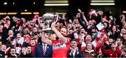 31 March 2024; Derry captain Conor Glass lifts the cup after his side's victory in the Allianz Football League Division 1 Final match between Dublin and Derry at Croke Park in Dublin. Photo by Piaras Ó Mídheach/Sportsfile