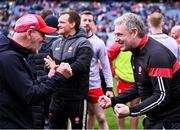 31 March 2024; Derry manager Mickey Harte, left, celebrates with selector Gavin Devlin after their side's penalty shoot-out victory in the Allianz Football League Division 1 Final match between Dublin and Derry at Croke Park in Dublin. Photo by Piaras Ó Mídheach/Sportsfile