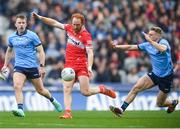 31 March 2024; Conor Glass of Derry in action Cian Murphy of Dublin during the Allianz Football League Division 1 Final match between Dublin and Derry at Croke Park in Dublin. Photo by John Sheridan/Sportsfile