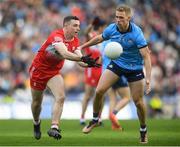 31 March 2024; Niall Toner of Derry in action against Paul Mannion of Dublin during the Allianz Football League Division 1 Final match between Dublin and Derry at Croke Park in Dublin. Photo by John Sheridan/Sportsfile