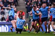 31 March 2024; Conor Glass of Derry tussles with Paddy Small of Dublin, 19, during the Allianz Football League Division 1 Final match between Dublin and Derry at Croke Park in Dublin. Photo by Piaras Ó Mídheach/Sportsfile