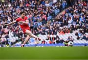 31 March 2024; Ethan Doherty of Derry shoots to score his penalty in the penalty shoot-out of the Allianz Football League Division 1 Final match between Dublin and Derry at Croke Park in Dublin. Photo by Piaras Ó Mídheach/Sportsfile