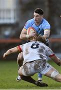 30 March 2024; Ruairi Shields of UCD in action against John Vinson of Dublin University during the annual Men’s Rugby Colours match between Dublin University and UCD at College Park in Trinity College, Dublin. Photo by Sam Barnes/Sportsfile