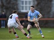 30 March 2024; Ruairi Shields of UCD in action against David Colbert of Dublin University during the annual Men’s Rugby Colours match between Dublin University and UCD at College Park in Trinity College, Dublin. Photo by Sam Barnes/Sportsfile