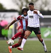 1 April 2024; Zishim Bawa of Drogheda United in action against Mayowa Animasahun of Dundalk during the SSE Airtricity Men's Premier Division match between Dundalk and Drogheda United at Oriel Park in Dundalk, Louth. Photo by Ben McShane/Sportsfile