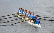 30 March 2024; The UCD Novice Women's team, from front to back, Ella Fitzpatrick, Phoebe Grimes, Geneviéve Dowling, Eve McCann, Caoimhe Quinn, Lynn Dwan, Katie Gibney, Orla O’Sullivan and Cox Neasa Farrell, make their way to the start for the annual Colours Boat Race between UCD and Trinity College on the River Liffey in Dublin. Photo by Sam Barnes/Sportsfile