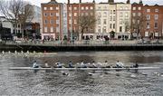 30 March 2024; The UCD Novice Men's team, from front to back, Zephan Mooney Jones, Eoin O’Reilly, Conor O’Reilly, Nicholas Donovan, Darragh Ryan-Cahill, Matthew McDonagh, Jake Walsh, Clive Graham and cox Maggie Bambury, during the annual Colours Boat Race between UCD and Trinity College on the River Liffey in Dublin. Photo by Sam Barnes/Sportsfile