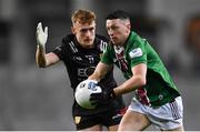 30 March 2024; Ronan O'Toole of Westmeath in action against Liam Kerr of Down during the Allianz Football League Division 3 final match between Down and Westmeath at Croke Park in Dublin. Photo by Shauna Clinton/Sportsfile