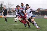 1 April 2024; Ryan O'Kane of Dundalk in action against Andrew Quinn of Drogheda United during the SSE Airtricity Men's Premier Division match between Dundalk and Drogheda United at Oriel Park in Dundalk, Louth. Photo by Ben McShane/Sportsfile