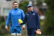 1 April 2024; Senior coach Jacques Nienaber, right, and Jack Conan during Leinster rugby squad training at UCD in Dublin. Photo by Harry Murphy/Sportsfile