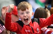 31 March 2024; A young Derry supporter during the Allianz Football League Division 1 Final match between Dublin and Derry at Croke Park in Dublin. Photo by Ramsey Cardy/Sportsfile