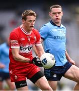 31 March 2024; Brendan Rogers of Derry and Brian Fenton of Dublin during the Allianz Football League Division 1 Final match between Dublin and Derry at Croke Park in Dublin. Photo by Ramsey Cardy/Sportsfile