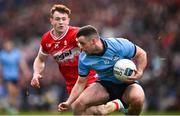 31 March 2024; Ross McGarry of Dublin in action against Lachlan Murray of Derry during the Allianz Football League Division 1 Final match between Dublin and Derry at Croke Park in Dublin. Photo by Ramsey Cardy/Sportsfile