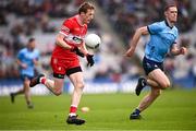31 March 2024; Brendan Rogers of Derry and Brian Fenton of Dublin during the Allianz Football League Division 1 Final match between Dublin and Derry at Croke Park in Dublin. Photo by Ramsey Cardy/Sportsfile