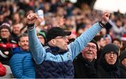 31 March 2024; A Dublin supporter celebrates during the Allianz Football League Division 1 Final match between Dublin and Derry at Croke Park in Dublin. Photo by Ramsey Cardy/Sportsfile