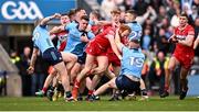 31 March 2024; Conor Glass of Derry and Paddy Small of Dublin tussle during the Allianz Football League Division 1 Final match between Dublin and Derry at Croke Park in Dublin. Photo by Ramsey Cardy/Sportsfile