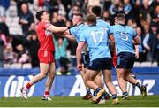 31 March 2024; Paddy Small of Dublin tussles with Conor McCluskey of Derry during the Allianz Football League Division 1 Final match between Dublin and Derry at Croke Park in Dublin. Photo by Ramsey Cardy/Sportsfile