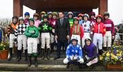 1 April 2024; An Taoiseach Leo Varadkar TD with the competing jockeys before the BoyleSports Irish Grand National Steeplechase on day three of the Fairyhouse Easter Festival at Fairyhouse Racecourse in Ratoath, Meath. Photo by Seb Daly/Sportsfile