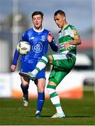 1 April 2024; Graham Burke of Shamrock Rovers in action against Ben McCormack of Waterford during the SSE Airtricity Men's Premier Division match between Waterford and Shamrock Rovers at the Regional Sports Centre in Waterford. Photo by Tyler Miller/Sportsfile