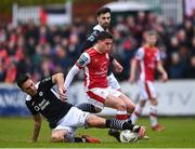 1 April 2024; Kian Leavy of St Patrick's Athletic in action against Max Mata of Sligo Rovers during the SSE Airtricity Men's Premier Division match between St Patrick's Athletic and Sligo Rovers at Richmond Park in Dublin. Photo by Harry Murphy/Sportsfile