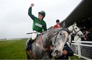 1 April 2024; Jockey JJ Slevin celebrates after winning the BoyleSports Irish Grand National Steeplechase, aboard Intense Raffles, on day three of the Fairyhouse Easter Festival at Fairyhouse Racecourse in Ratoath, Meath. Photo by Seb Daly/Sportsfile