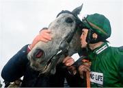 1 April 2024; Jockey JJ Slevin and Intense Raffles after winning the BoyleSports Irish Grand National Steeplechase on day three of the Fairyhouse Easter Festival at Fairyhouse Racecourse in Ratoath, Meath. Photo by Seb Daly/Sportsfile