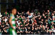 1 April 2024; Shamrock Rovers supporters watch on as Graham Burke of Shamrock Rovers prepares to take a free-kick during the SSE Airtricity Men's Premier Division match between Waterford and Shamrock Rovers at the Regional Sports Centre in Waterford. Photo by Tyler Miller/Sportsfile