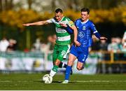 1 April 2024; Graham Burke of Shamrock Rovers in action against Ben McCormack of Waterford during the SSE Airtricity Men's Premier Division match between Waterford and Shamrock Rovers at the Regional Sports Centre in Waterford. Photo by Tyler Miller/Sportsfile