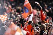 31 March 2024; Armagh supporters celebrate a late point during the Allianz Football League Division 2 Final match between Armagh and Donegal at Croke Park in Dublin. Photo by Ramsey Cardy/Sportsfile