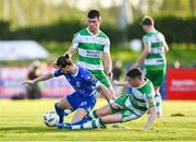 1 April 2024; Connor Parsons of Waterford is tackled by Gary O'Neill, right, and Josh Honohan of Shamrock Rovers during the SSE Airtricity Men's Premier Division match between Waterford and Shamrock Rovers at the Regional Sports Centre in Waterford. Photo by Tyler Miller/Sportsfile