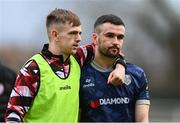 1 April 2024; Michael Duffy of Derry City, right, is consoled by team-mate Ciaron Harkin after the SSE Airtricity Men's Premier Division match between Shelbourne and Derry City at Tolka Park in Dublin. Photo by Stephen McCarthy/Sportsfile