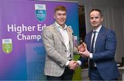 1 April 2024; Ronan Mc Caffrey, UU, Teemore Shamrocks & Fermanagh receives his 2023 Electric Ireland GAA Higher Education Rising Stars Football Team of the Year Award from Chair of the GAA Higher Education Committee Michael Hyland during the 2024 Electric Ireland GAA Higher Education Rising Star Awards at the Castleknock Hotel in Dublin. Photo by David Fitzgerald/Sportsfile