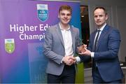 1 April 2024; Ryan Magill, UU, Burren & Down receives his 2023 Electric Ireland GAA Higher Education Rising Stars Football Team of the Year Award from Chair of the GAA Higher Education Committee Michael Hyland during the 2024 Electric Ireland GAA Higher Education Rising Star Awards at the Castleknock Hotel in Dublin. Photo by David Fitzgerald/Sportsfile