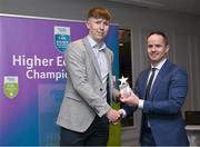 1 April 2024; Gearoid O’Connor, University of Limerick, Moyne-Templetuohy & Tipperary receives his 2023 Electric Ireland GAA Higher Education Rising Stars Hurling Team of the Year Award from Chair of the GAA Higher Education Committee Michael Hyland during the 2024 Electric Ireland GAA Higher Education Rising Star Awards at the Castleknock Hotel in Dublin. Photo by David Fitzgerald/Sportsfile