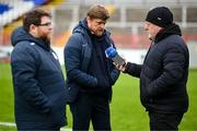 1 April 2024; Shelbourne manager Damien Duff speaks to John Kenny of RTÉ Radio, in the company of Shelbourne's head of media and communications Darren Cleary, left, after the SSE Airtricity Men's Premier Division match between Shelbourne and Derry City at Tolka Park in Dublin. Photo by Stephen McCarthy/Sportsfile