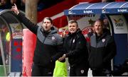 1 April 2024; Derry City manager Ruaidhrí Higgins with coach Conor Loughrey and assistant manager Paul Hegarty, right, during the SSE Airtricity Men's Premier Division match between Shelbourne and Derry City at Tolka Park in Dublin. Photo by Stephen McCarthy/Sportsfile