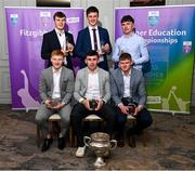 1 April 2024; MIC?L players, back row, from left, Cathal Quinn, Diarmuid Ryan, Adam Hogan and front row, from left, Shane Meehan, Jason Gillane and ?Joe Caesar on the 2023 Electric Ireland GAA Higher Education Rising Stars Hurling Team of the Year during the 2024 Electric Ireland GAA Higher Education Rising Star Awards at the Castleknock Hotel in Dublin. Photo by David Fitzgerald/Sportsfile