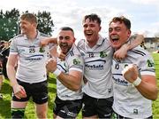 31 March 2024; Warwickshire players, from left, Paddy Hands, Oisín Slattery, David Devine and Dan Lowry celebrate after their side's victory in the Allianz Hurling League Division 3B Final match between Fermanagh and Warwickshire at St Joseph's Park in Ederney, Fermanagh. Photo by Sam Barnes/Sportsfile