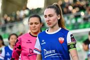 30 March 2024; Talia White of Treaty United leads her side out onto the pitch before the SSE Airtricity Women's Premier Division match between Shamrock Rovers and Treaty United at Tallaght Stadium in Dublin. Photo by Tyler Miller/Sportsfile